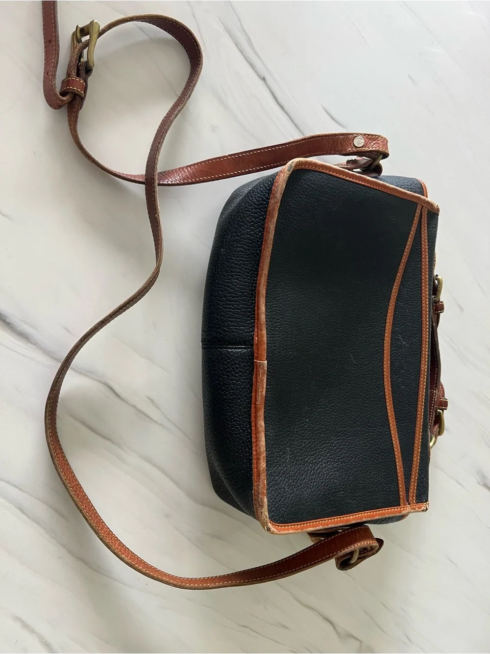 Dooney & Bourke Black and Brown Leather Satchel with Brass Turn Lock